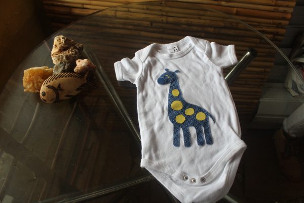 Baby Onesie Vest with a dotted giraffe