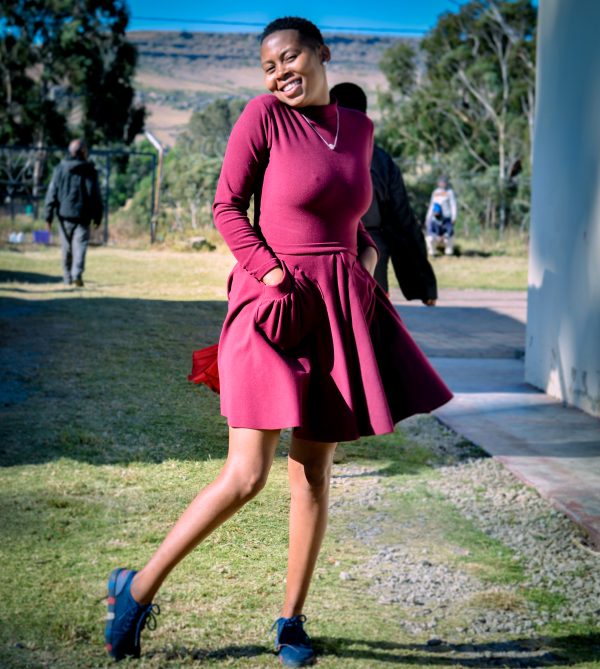Maroon short skirt with front pockets and a matching poloneck body suit - Image 4